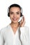 Beautiful young consulting manager with headset on white background