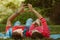 Beautiful young couple in love decided to have a romantic picnic in the park. A date, time spent together is priceless. Camping in