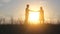 A beautiful young couple at sunset stretch their hands to each other.