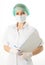 Beautiful young female doctor in medical gown and