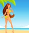 Beautiful young girl in bikini on a tropical beach