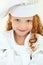 Beautiful Young Girl Child in Chef Uniform and Hat