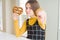 Beautiful young girl kid eating german snack salty pretzel pointing with finger to the camera and to you, hand sign, positive and