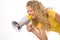 Beautiful young girl with megaphone over white