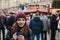 Beautiful young girl with a mug of hot drink at the Christmas market in Dresden. Celebrating Christmas in Europe