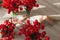 A beautiful young girl in a peignoir is lying on the floor between large bouquets of tulips. March 8 concept.