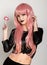 Beautiful young girl with pink hair, smile and brigth light with candy lolipop
