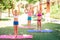 Beautiful young girls working out, exercising outdoor