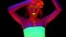A beautiful young half-naked girl crossing her hands and dancing with glowing paint on her body in black light