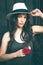 Beautiful young latino woman with panama hat portrait outdoor