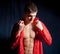 Beautiful young male in red shirt