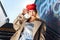 Beautiful young photo model wearing red beret and accessories