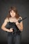 The beautiful young sexual woman with a rifle