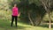 Beautiful young sporty women doing weight training in the park