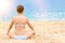 Beautiful young teenager girl practice yoga meditation summer sea beach.