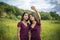 Beautiful young twins girls doing selfie