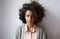 Beautiful young woman with afro hairstyle