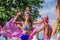 Beautiful young woman in bikini walking on stilts during Bloco Orquestra Voadora in support of feminism at Carnaval 2017