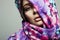 Beautiful young woman in colorful hood