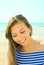 Beautiful Young Woman Girl Sun Tan on the Beach by Ocean Smiling. Candid Shot Authentic Genuine Emotions. Blue Sky Turquoise Sea