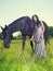 Beautiful young woman and horse