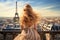 Beautiful young woman with long curly blonde hair on the roof of the Eiffel tower in Paris, France, Once in Paris. Back slim chic