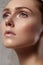 Beautiful young woman with perfect clean shiny skin, natural fashion makeup. Close-up woman, fresh spa look