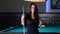 Beautiful Young Woman Playing Billiards.