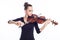 Beautiful young woman playing violin, studio shot