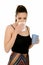 Beautiful young woman with pony tail holding cup and tissue, having flu