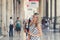 Beautiful Young Woman Is Posing at the Railway Terminal