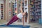 Beautiful young woman practices yoga asana Beautiful young woman practices yoga asana Vasishthasana - side plank pose in
