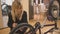 Beautiful young woman pumps her bmx bicycle wheel