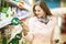 Beautiful young woman shopping for organic groceries