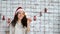 Beautiful young woman with sparkles over colorful background. Closeup beauty portrait of young girl holding sparklers