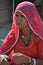 Beautiful young woman wearing Rajasthani traditional
