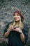 Beautiful young woman wearing rastafarian hat