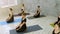 Beautiful young women working out doing yoga exercise