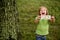 Beautifull happy little girl with dollar note