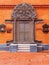 Beautifull pattern on a red brick wall of a public Buddhist temp