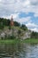 Beautifull wooden christian orthodox church on the bank of the r