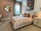 A beautifully appointed bedroom in a Toll Brothers luxury home in Orlando, Florida