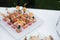 beautifully decorated banquet table with appetizers canapes. buffet for a holiday. catering buffet with snacks