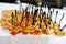 Beautifully decorated catering banquet table with different food snacks and appetizers with sandwich, caviar, fresh fruits on