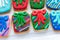 Beautifully decorated homemade Christmas cookies made to look like Christmas presents