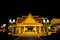 Beautifully decorated passage to the temple complex at night. Night illumination of buildings