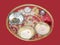 Beautifully Decorated Pooja Thali for festival celebration to worship,scented sticks in brass plate, hindu puja thali