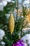 Beautifully decorated real tree closeup with cones and balls of snow-crushed balls in the Ukrainian village