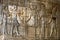 A beautifully decorated wall displaying engravings and hieroglyphs at the Temple of Kom Ombo in Egypt.