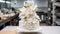 A beautifully decorated wedding cake with intricate fondant details and flowers